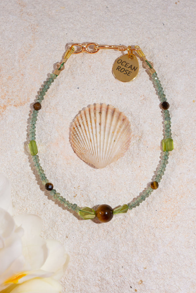 Spring has sprung with this enchanting tendril shaded gemstone bracelet.