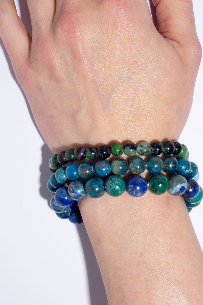 A beautiful trio of stretch bracelets in a tropical jungle.