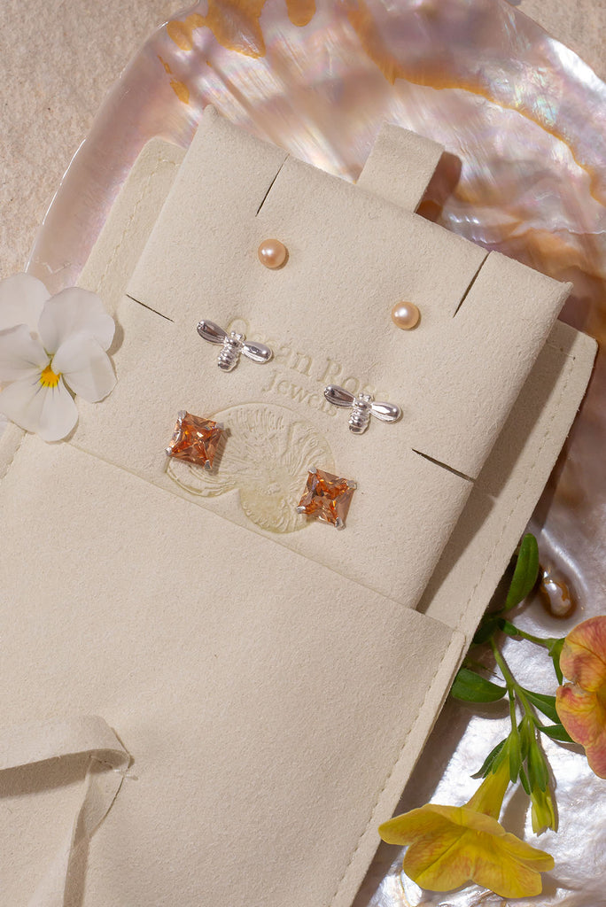 A dreamy set of stud earrings inspired by warm Spring days.