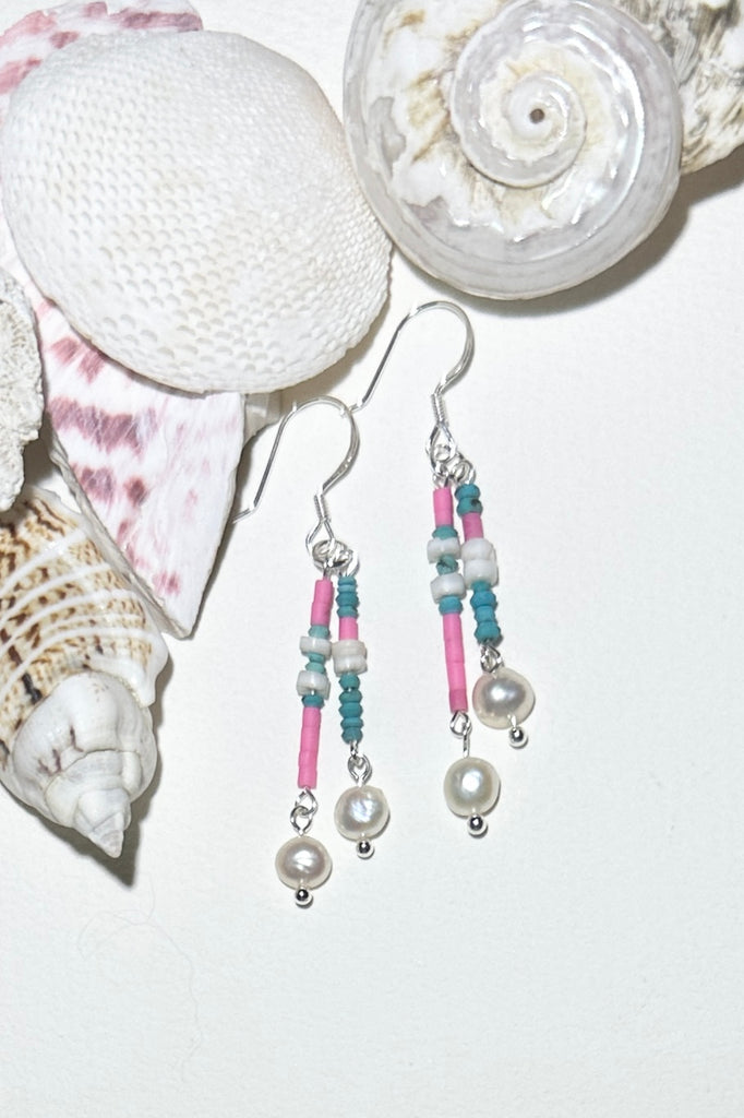 Lightweight bright swing earrings.
Small freshwater pearls.
Afghan "sand" beads in pink and turquoise.