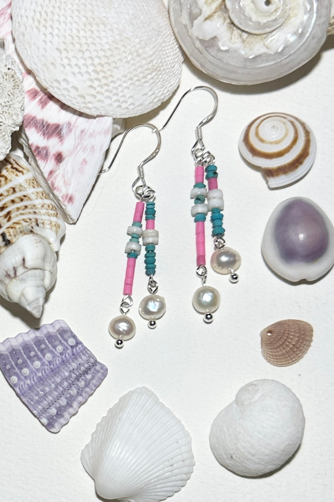 Lightweight bright swing earrings.
Small freshwater pearls.
Afghan "sand" beads in pink and turquoise.