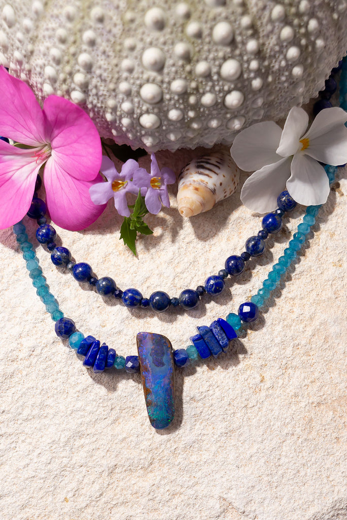 An ocean flowing to the beach of an ancient land, a lovely slice of cobalt, teal and green. Strung on an Apatite bead necklace with bright blue Lapis Lazuli adding a highlight.