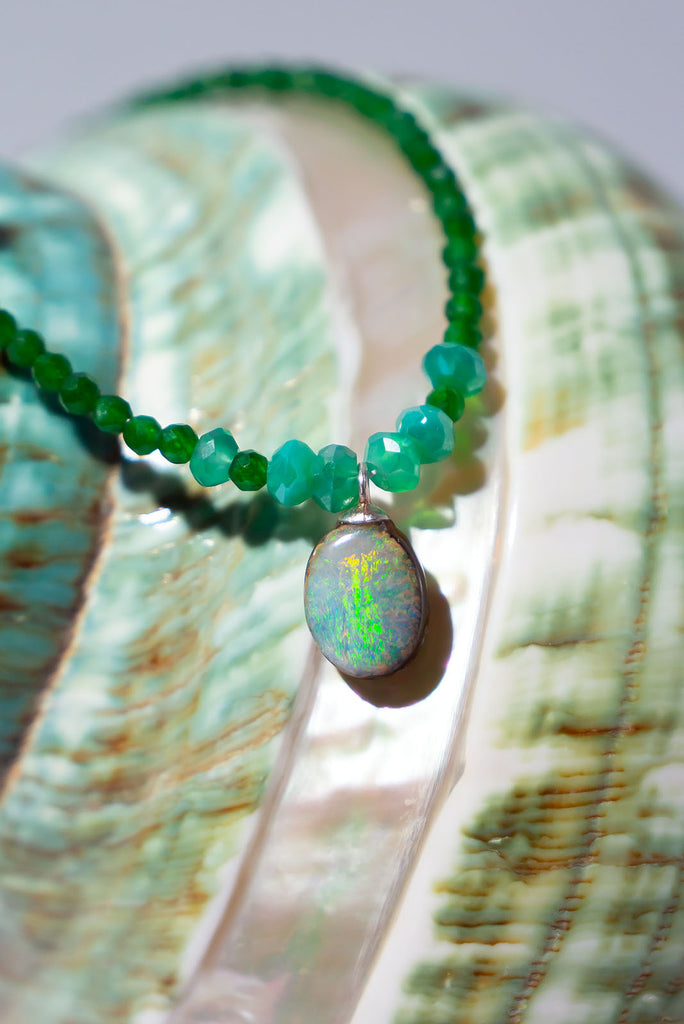 If you love nature and green trees this bright little oval opal on a necklace of tiny faceted green Onyx beads is meant to be yours.