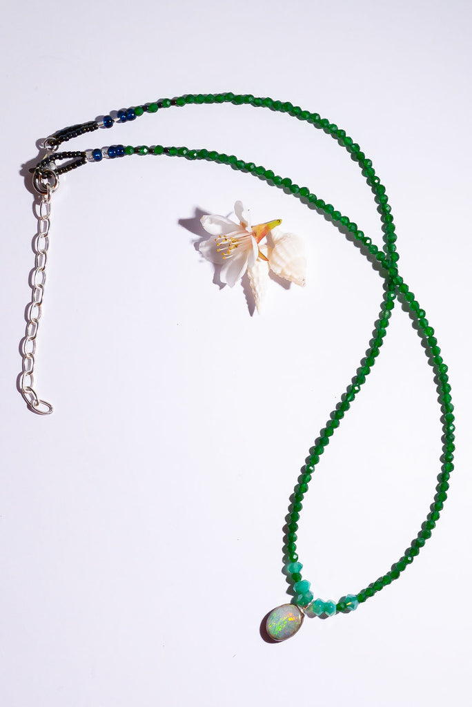 If you love nature and green trees this bright little oval opal on a necklace of tiny faceted green Onyx beads is meant to be yours.