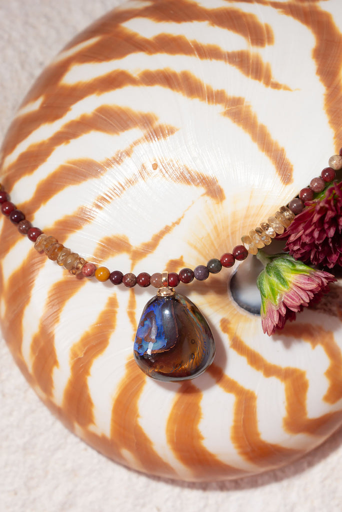 Rich with the tones of the beautiful Australian outback this beautiful necklace features 3 Australian mined gemstones including a beautiful solid Australian boulder opal pendant.