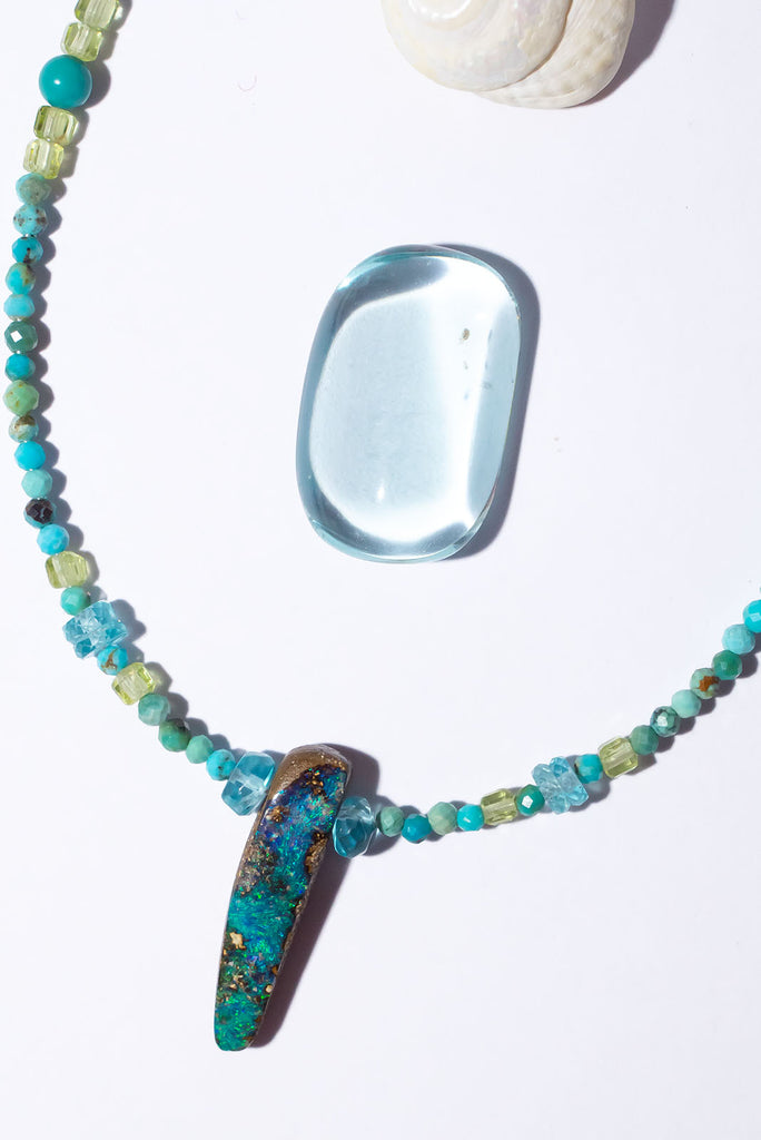 Cool like a river our beautiful Necklace Australian Opal River Rocks shimmers with beautiful blue & aqua hues.