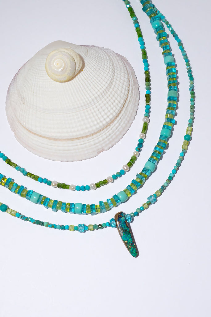 Cool like a river our beautiful Necklace Australian Opal River Rocks shimmers with beautiful blue & aqua hues.