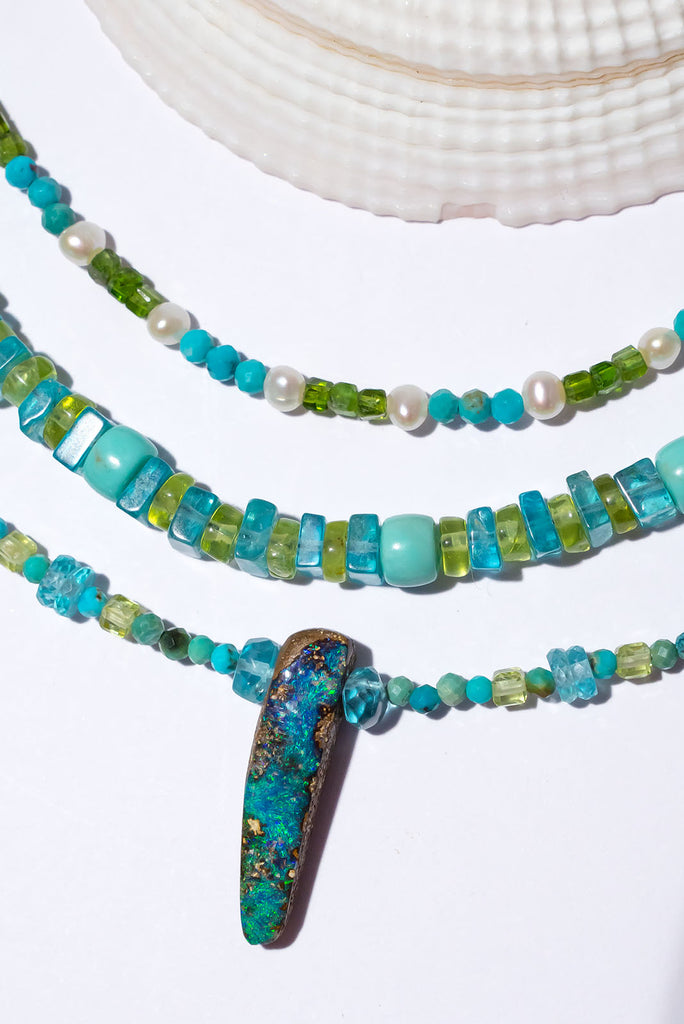 Cool like a river our beautiful Necklace Australian Opal River Rocks shimmers with beautiful blue & aqua hues.