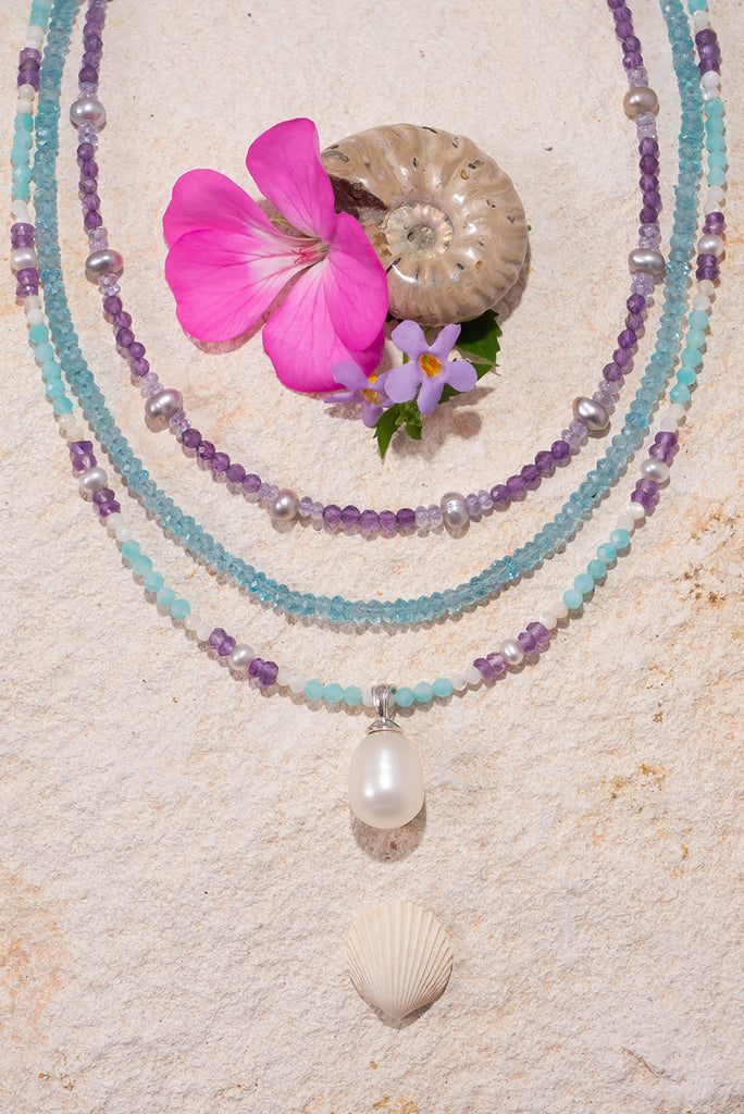 This delicate shimmering necklace features beautiful soft Spring colours.