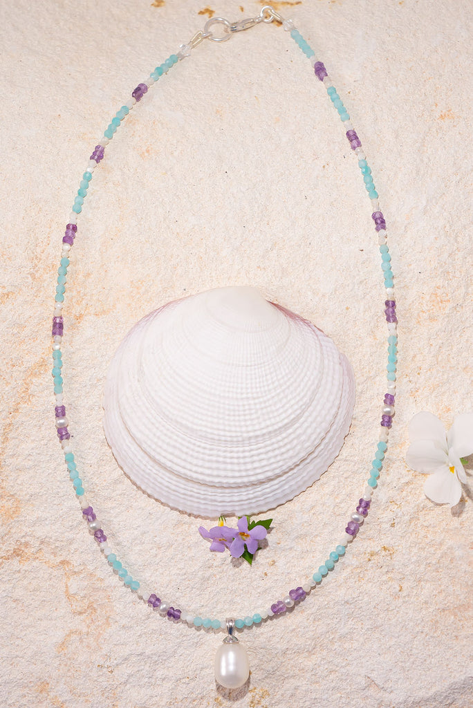 This delicate shimmering necklace features beautiful soft Spring colours.