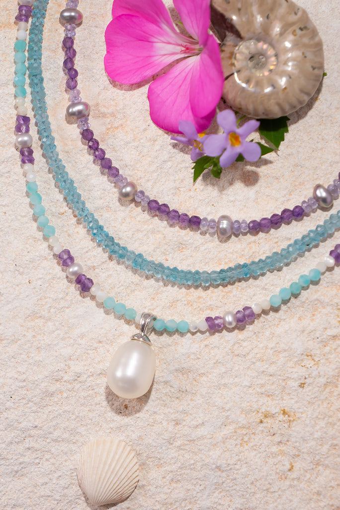 This delicate shimmering necklace features beautiful soft Spring colours.