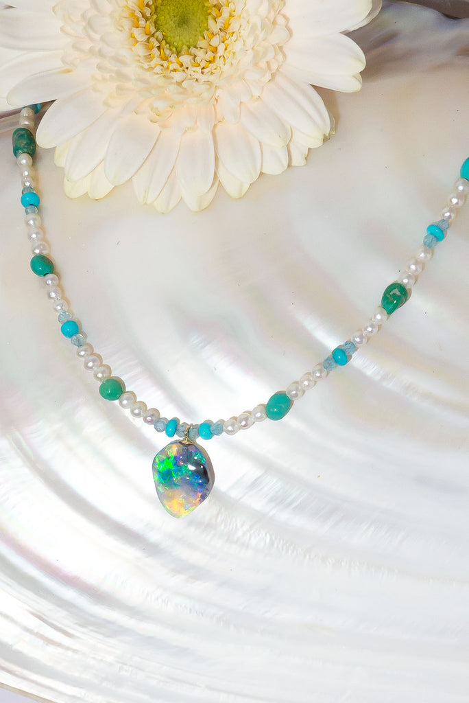 This gorgeous jewel tones necklace features an enchanting solid Australian boulder opal pendant.