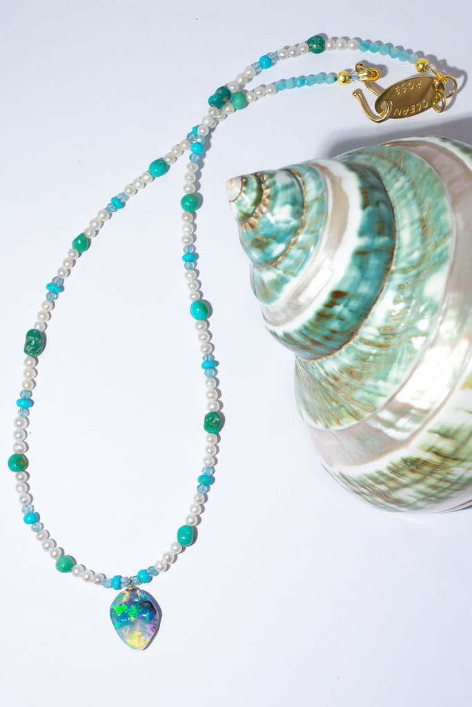 This gorgeous jewel tones necklace features an enchanting solid Australian boulder opal pendant.