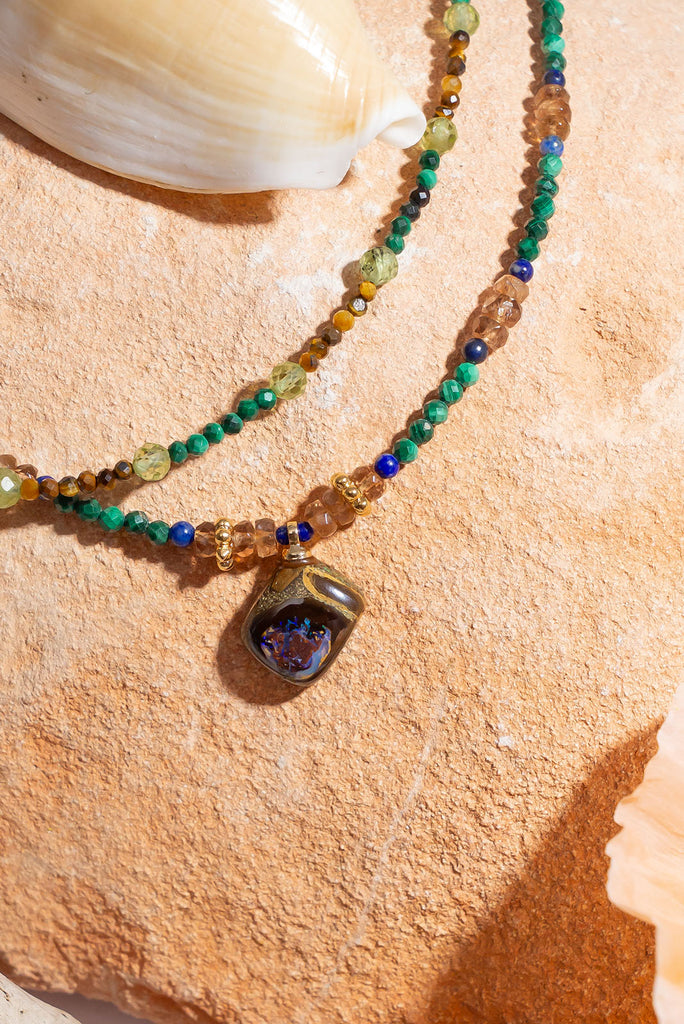 Like a relic from a world lost to the jungle this beautiful necklace will enchant you with its magic.