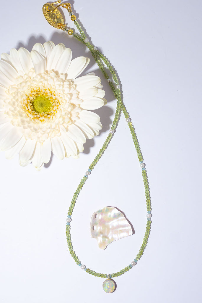 Shimmering in the sunlight this enchanting necklace is a gorgeously green dream.