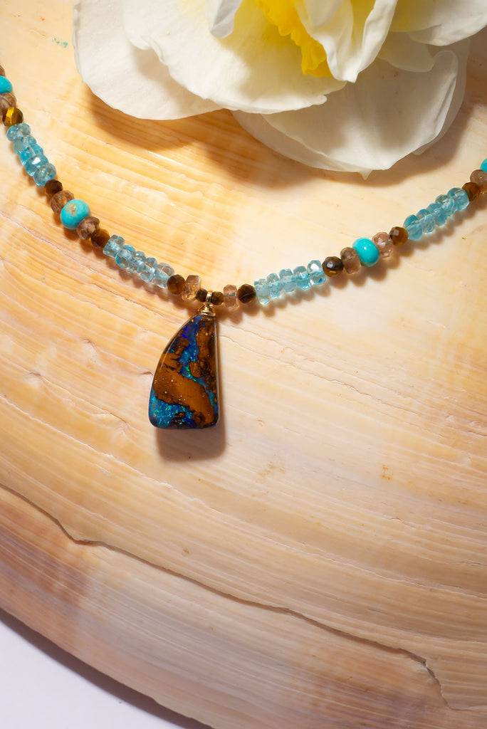 Get lost in the beautiful shimmering blues & green of this Australian Solid Boulder Opal.