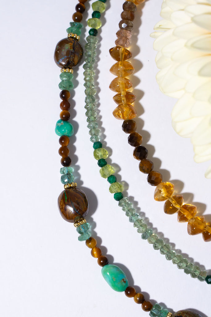 Featuring one of a kind Australian boulder opal beads this magical gemstone necklace was inspired by the beautiful desert palm oasis.