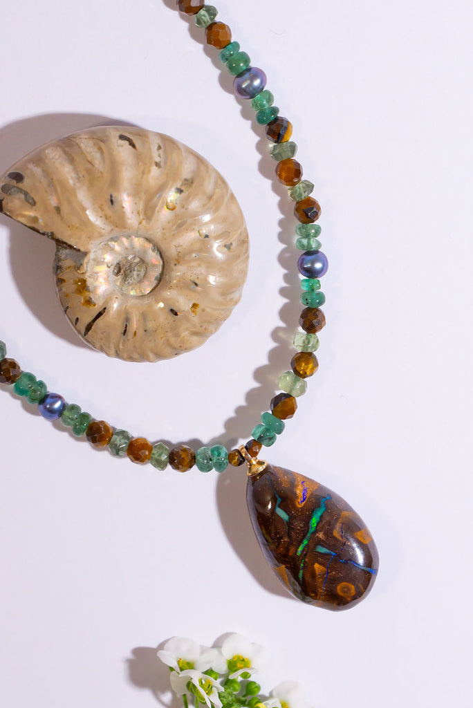 A beautiful blend of earthy brown hues, shimmering pearls and gorgeous greens. This is enchanting necklace is inspired by the colours of a tropical Queensland rainforest.