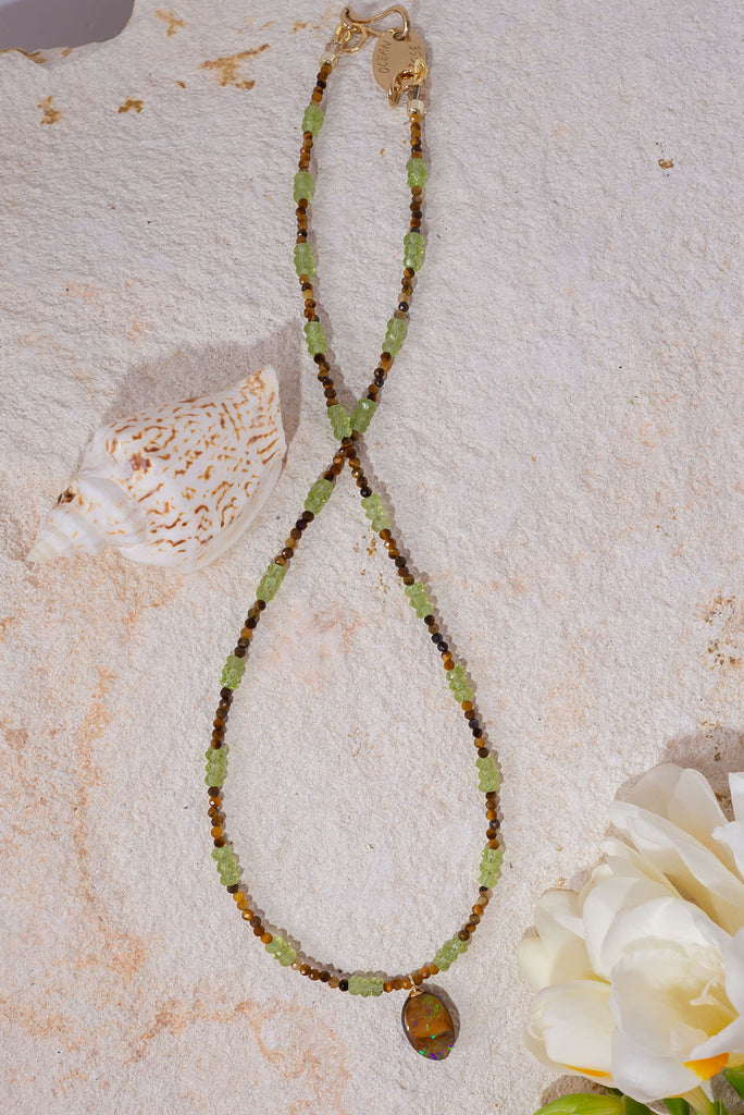 Soft & warm our Necklace Gemstone Rainforest Sunlight is inspired by the warm dappled sunlight as it filters through the leaf green foliage of a tropical rainforest.