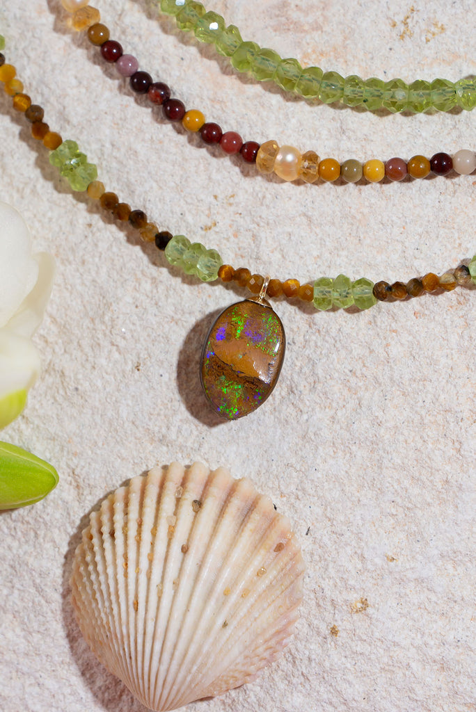 Soft & warm our Necklace Gemstone Rainforest Sunlight is inspired by the warm dappled sunlight as it filters through the leaf green foliage of a tropical rainforest.