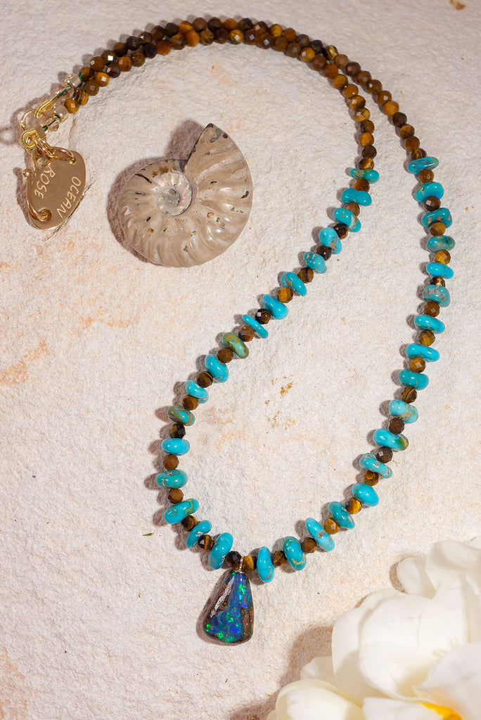 The combination of beautiful Lone Mountain turquoise and shimmering boulder opal from Winton, Australia make this gorgeous piece a vibrant choice for Summer.