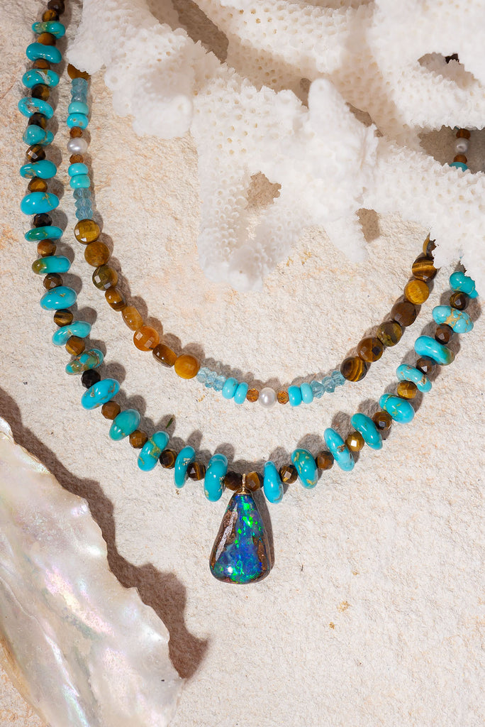 The combination of beautiful Lone Mountain turquoise and shimmering boulder opal from Winton, Australia make this gorgeous piece a vibrant choice for Summer.