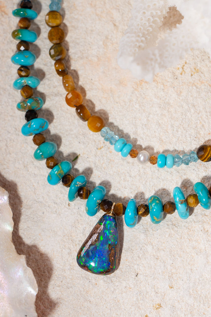 The combination of beautiful Lone Mountain turquoise and shimmering boulder opal from Winton, Australia make this gorgeous piece a vibrant choice for Summer.