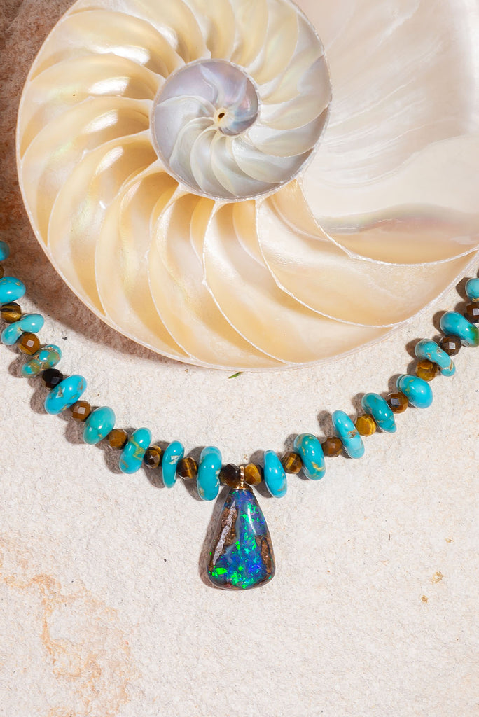 The combination of beautiful Lone Mountain turquoise and shimmering boulder opal from Winton, Australia make this gorgeous piece a vibrant choice for Summer.