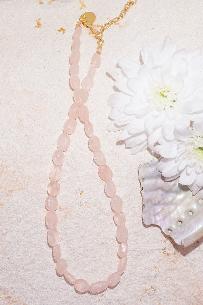 A delicate shade of pastel rose pink this piece would make a romantic addition to any wardrobe.