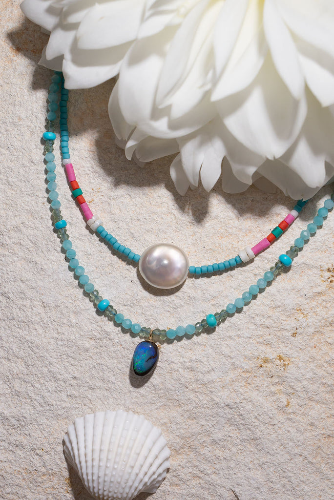 Discover the refreshing ocean colours of our Necklace Sea Spray Opal.