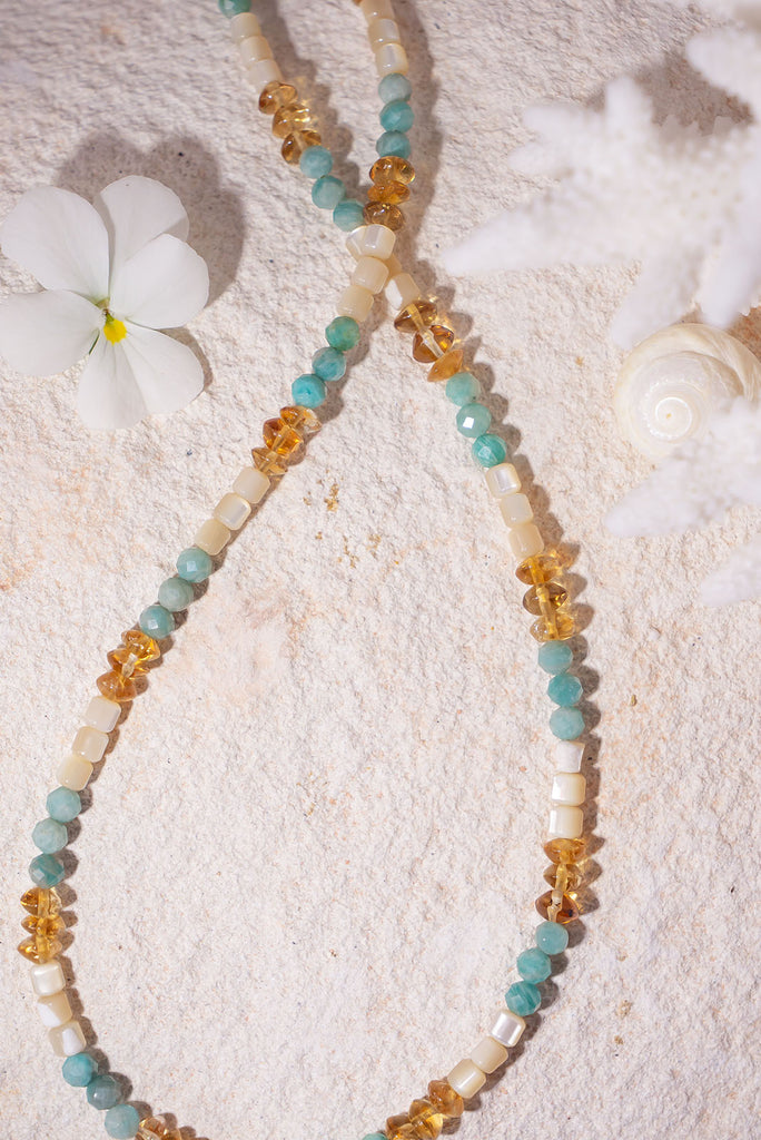 This necklace will have you dreaming of soft sea breezes, warm golden sands and cool aqua waters.