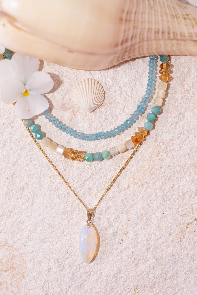 This necklace will have you dreaming of soft sea breezes, warm golden sands and cool aqua waters.