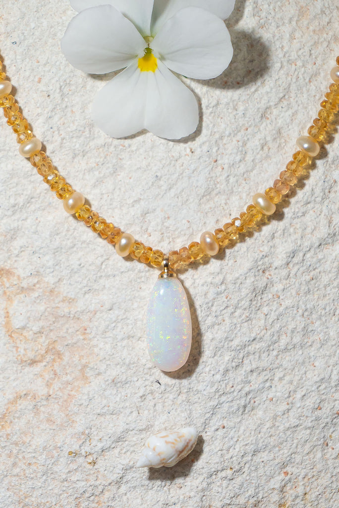 Gorgeous and glowing this beautiful opal & gemstone necklace sings of happy Summer days.