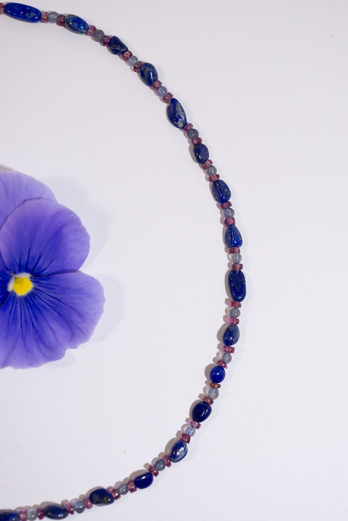 Featuring beautiful lapis lazuli pebble style beads this the perfect piece for anyone who loves jewel tones.