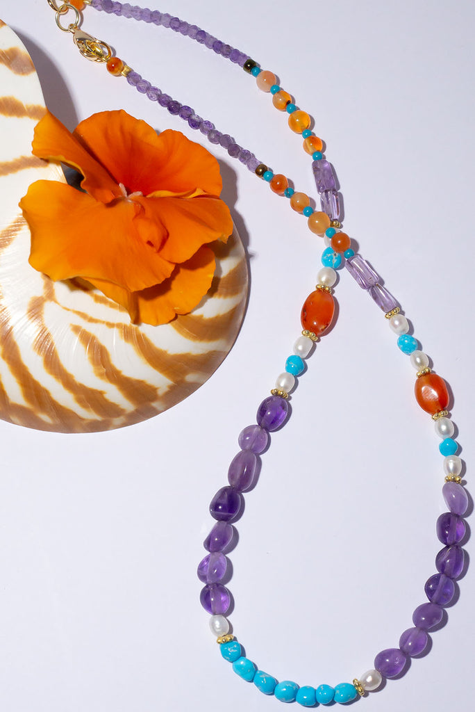 Be the happiest person in the room, our Inez gemstone necklaces bring a joyous tumble of colourful gemmy stones.
