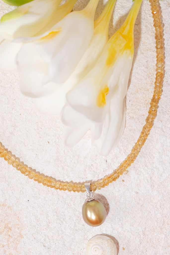 Like the sunshine after the rain this radiant necklace shimmers, shines & sparkles.