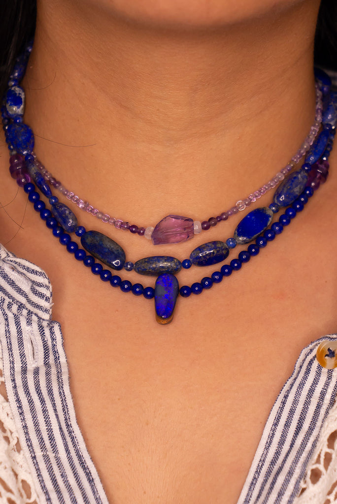 All about the ruggedness of opal and the power of the blue Lapis Lazuli beads, the clear bright Amethyst gives light and enchantment.