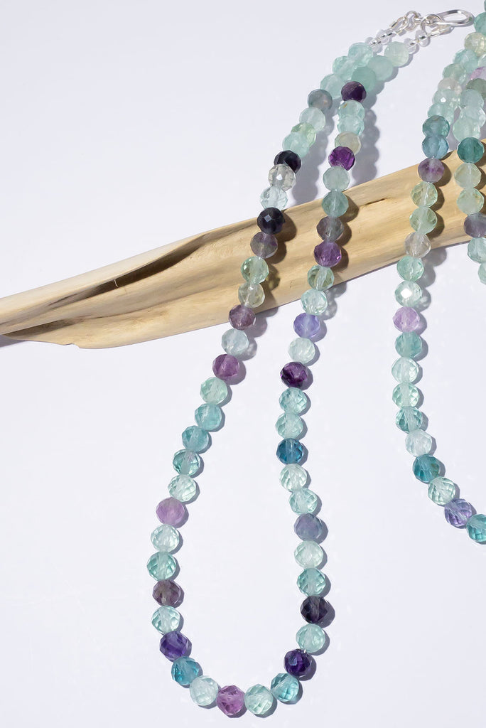 Love this subtle green and purple necklace and transform any negative energy to positive energy.