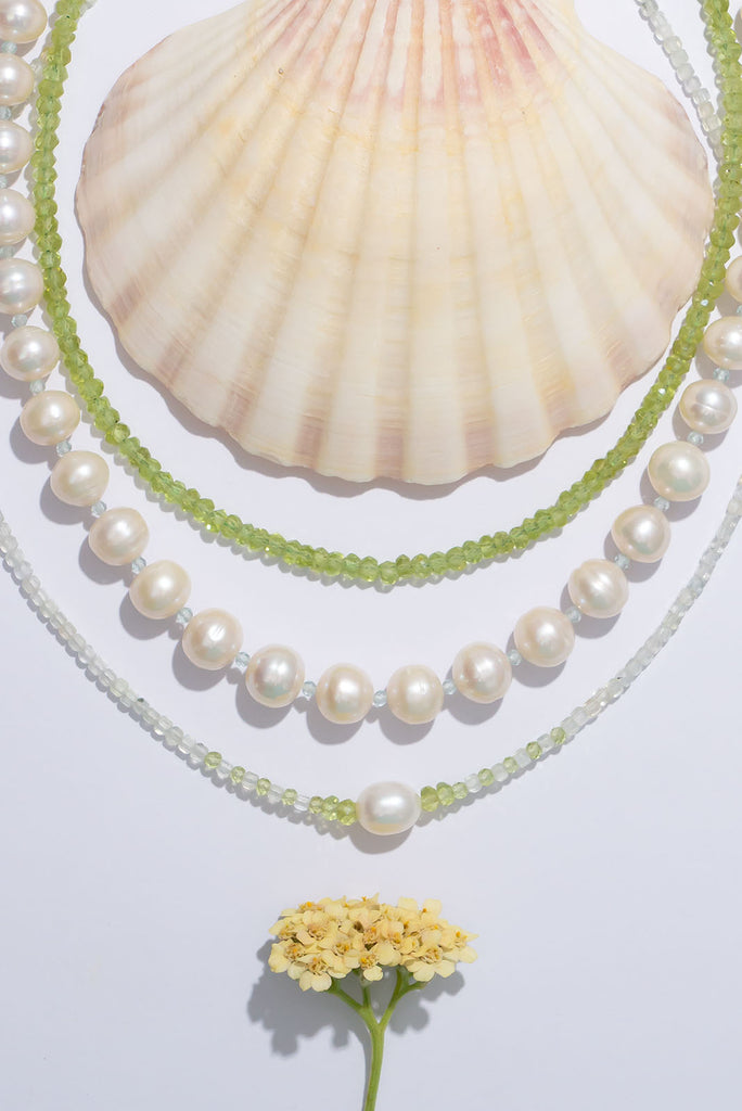 Beautiful gemstones in the softest shades of green and a gorgeous shimmering pearl.