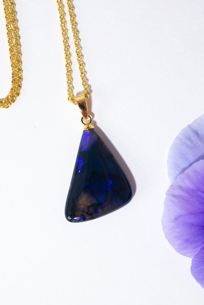 Like a stormy twilight sky this gorgeous opal shimmers with flashes of colour.