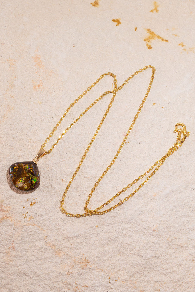 A beautiful statement piece with striking green & gold flashes this Australia boulder opal are truly eye catching.