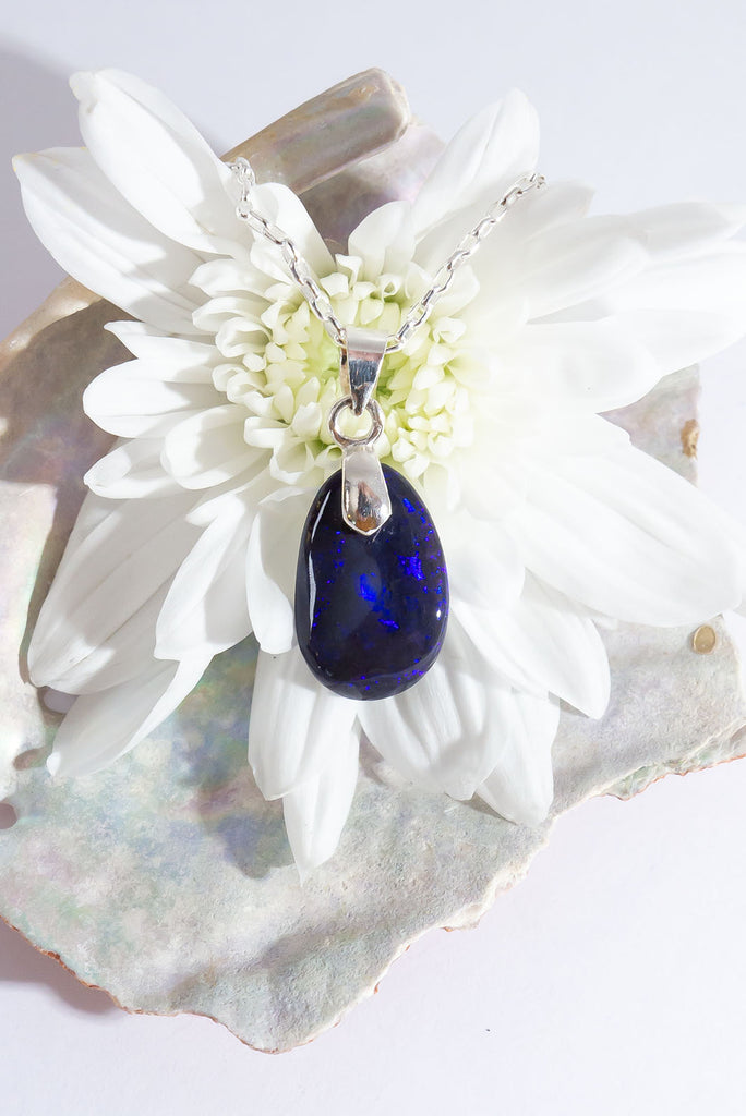 Get lost in the enthralling midnight blue hues of this magical Australian Opal pendant.