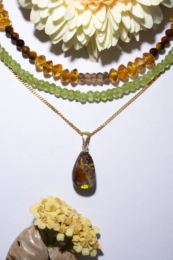 A beautiful statement piece with striking flashes in different shades of green, this Australia boulder opal is reminiscent of African plains after a rainstorm.